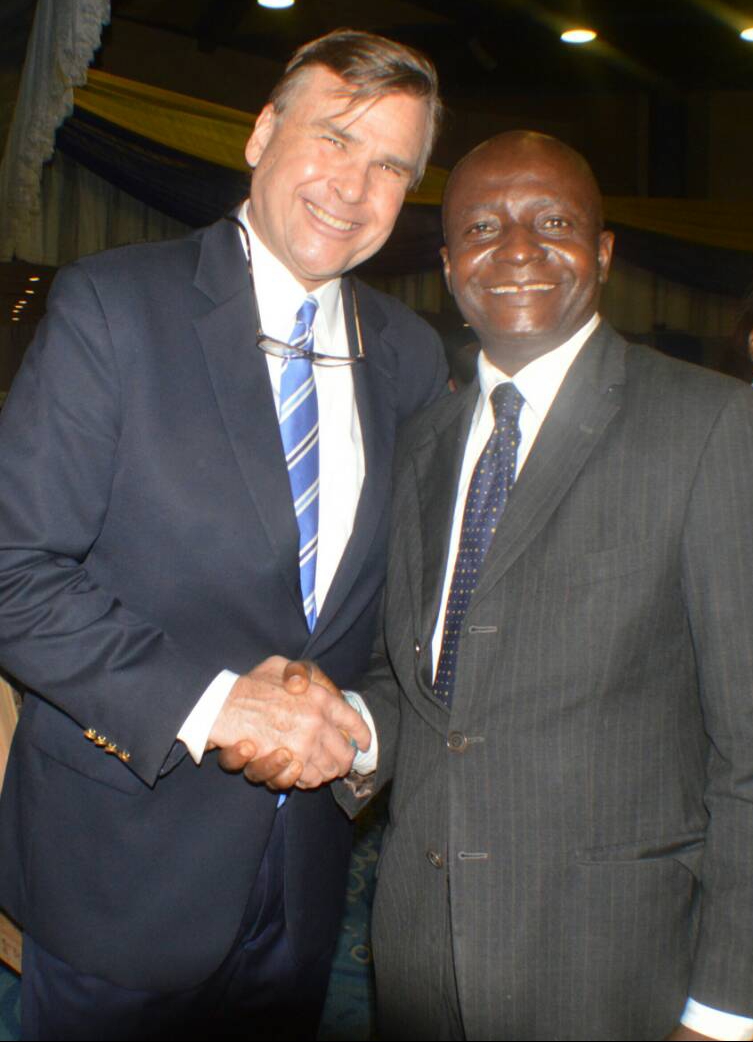 AcclaimNigeria Int’nal Magazine Boss, Mr.Olumide Ogunlade with former U.S. Ambassador to Nigeria, H.E Stuart Symington.